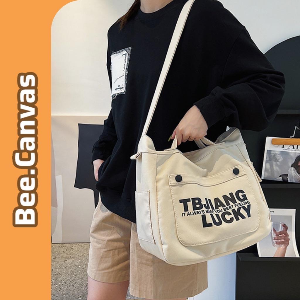 Túi vải Canvas đeo chéo đi học, Túi tote đeo vai Lucky phối màu nam nữ ...