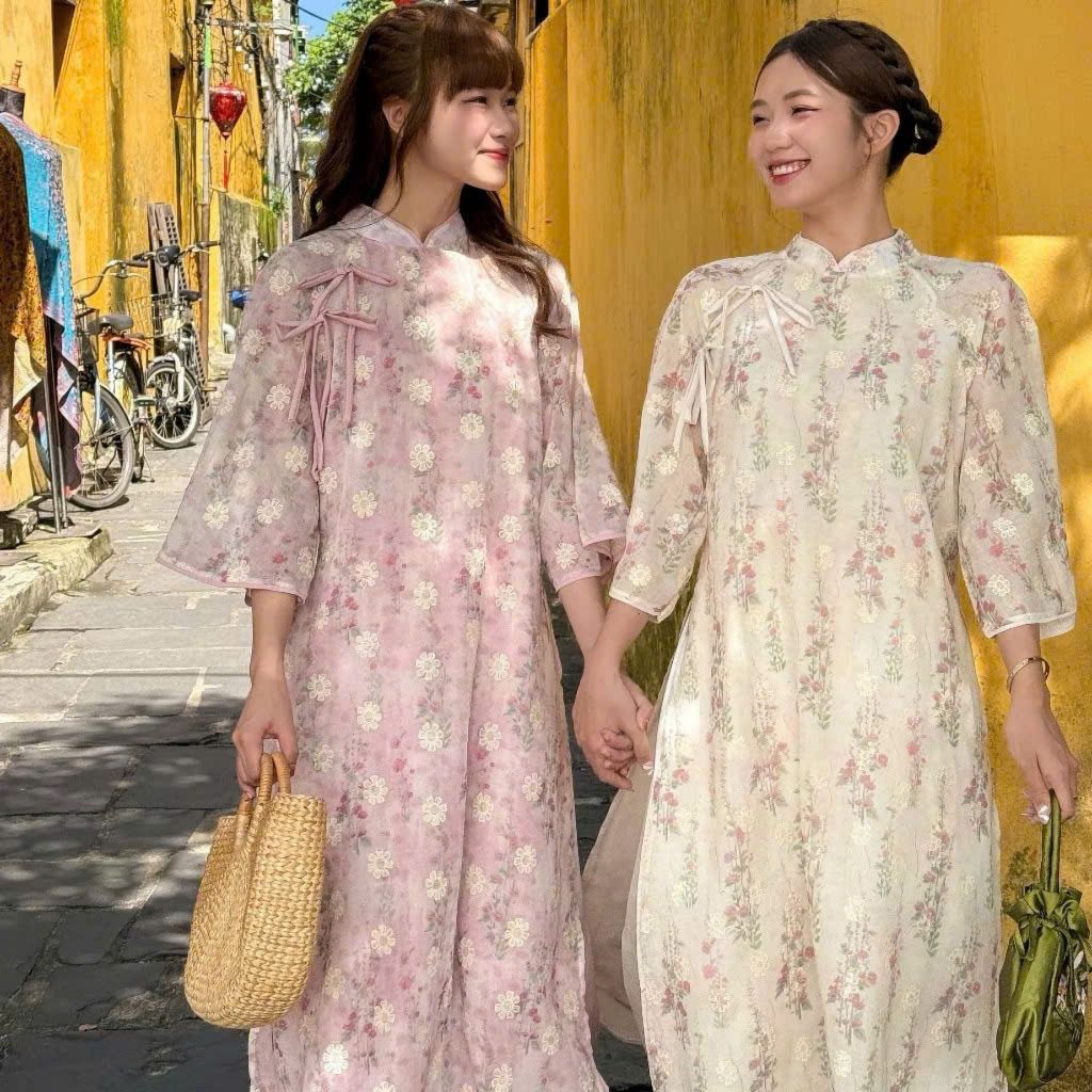 Áo dài voan tơ Bạch Vũ In hoa Tamdesigner phối thắt nơ đôi kèm quần satin bóng, Áo dài cách tân đẹp nhất 2026 T21