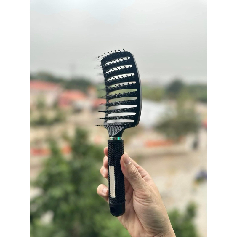 Lược bàn gỡ rối tóc. Gỡ rối nhẹ nhàng ko làm đau đầu người sử dụng.