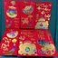 Set 6 Bao Lì Xì Đỏ Chữ Nổi Câu Chúc Nhũ Kim Tuyến Ngũ Sắc In Nổi 3D Cao Cấp Bìa Cứng Dày Dặn Lì Xì 2026 BỐ KHỦNG LONG