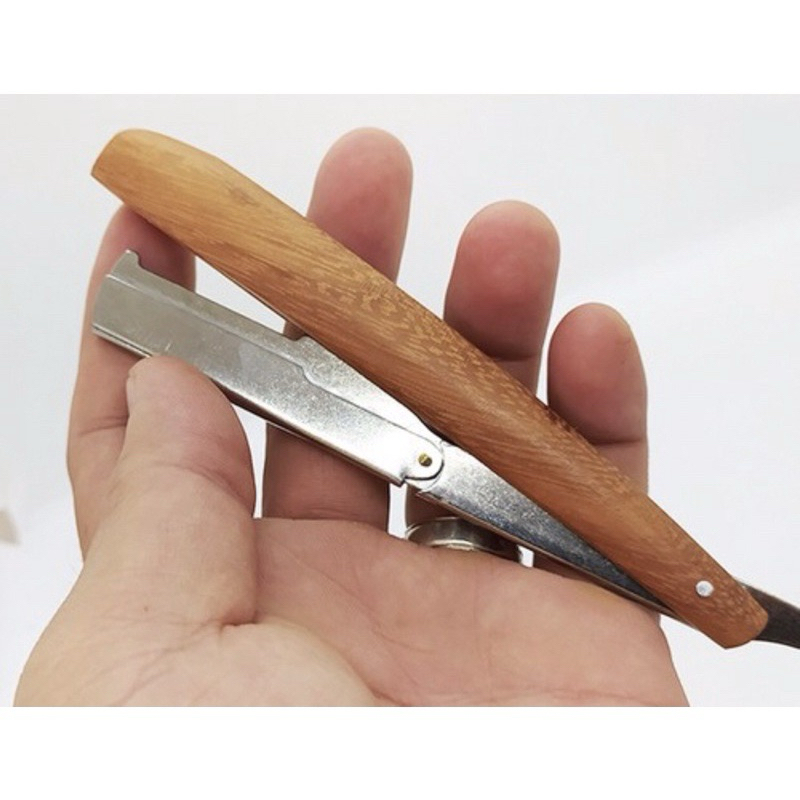 Dao cạo lông mặt, loại có thể thay lưỡi lam sau mỗi lần sử dụng.