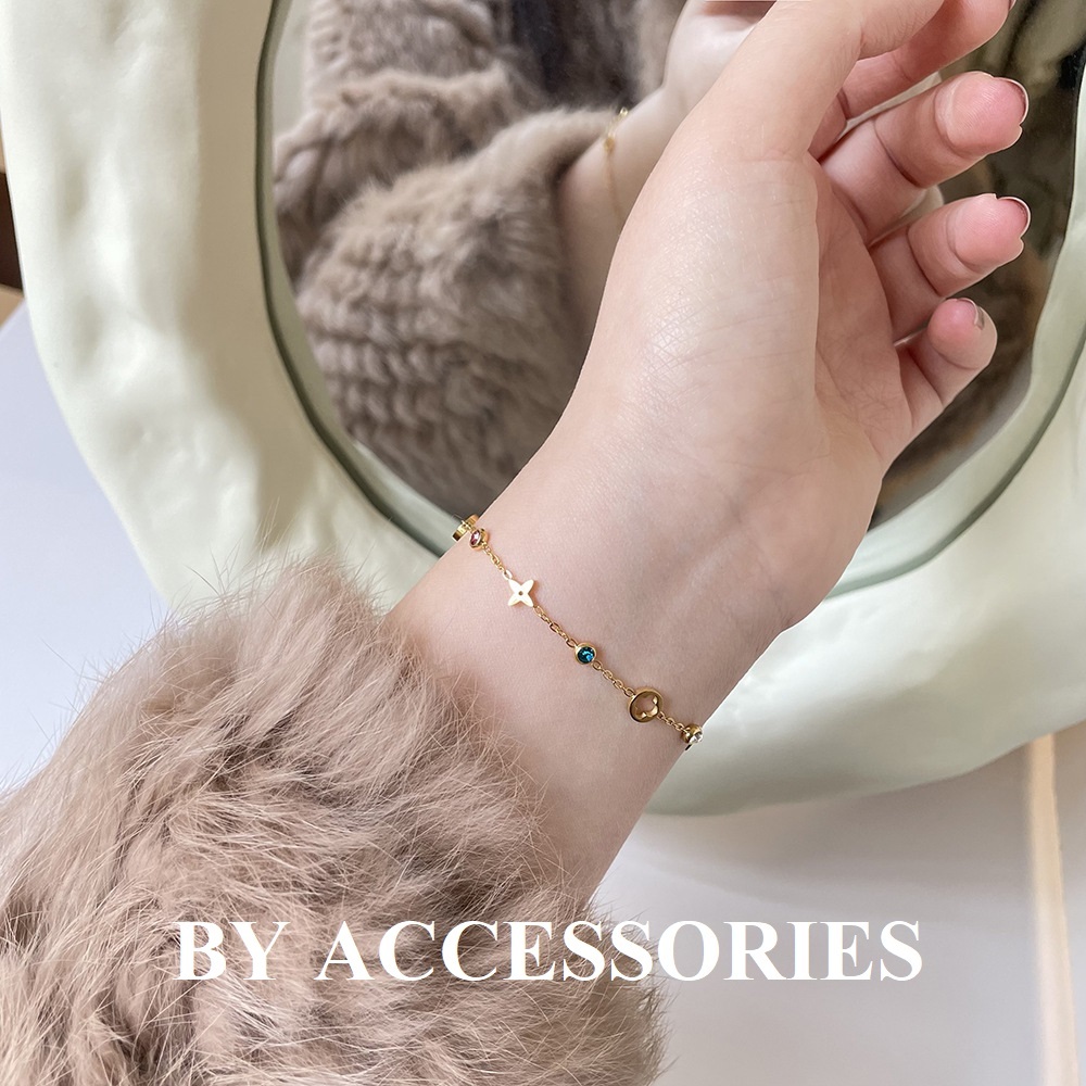 Lắc tay nữ titan hoa lá phối đá tròn nhiều màu sắc mạ vàng 18K xinh xắn không gỉ WB2422