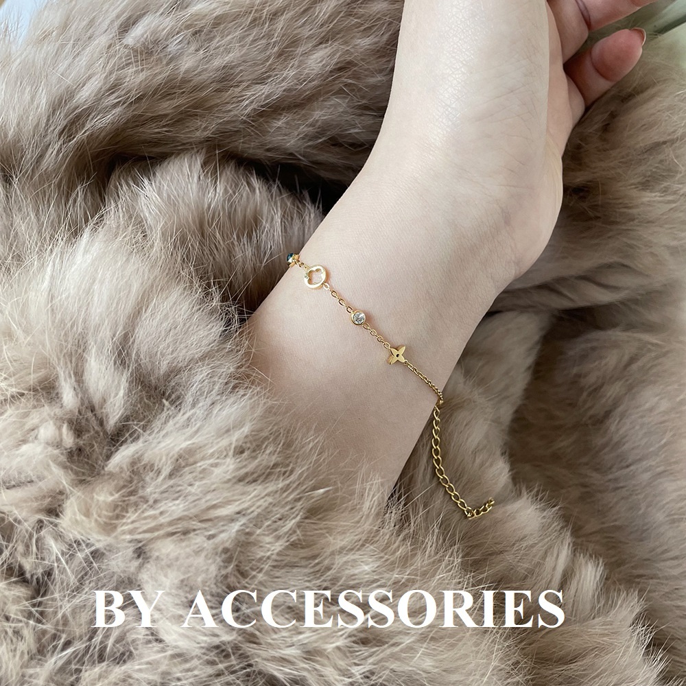 Lắc tay nữ titan hoa lá phối đá tròn nhiều màu sắc mạ vàng 18K xinh xắn không gỉ WB2422