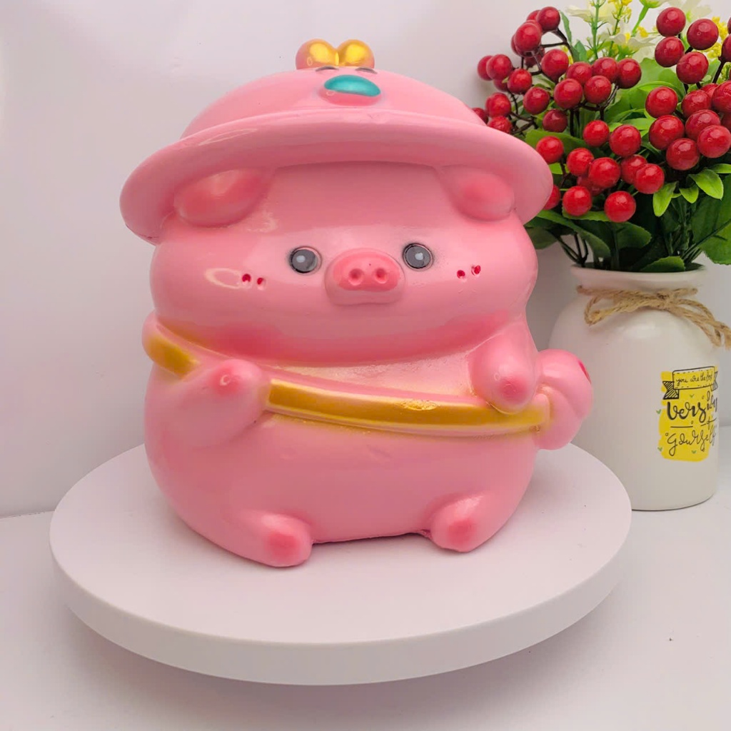 Heo đất lợn đất tiết kiệm Heo đội mũ vịt đeo túi size nhỏ- heo đất tiết kiệm trang trí, decor