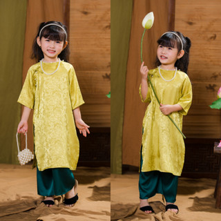 Áo dài tết cách tân cho bé gái phối nơ đi chơi lễ hội vải gấm lụa in nổi cho bé đính ngọc Tết 2026 DA01 - BIATONKIDS