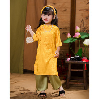 Áo dài tết cách tân cho bé gái phối nơ đi chơi lễ hội vải gấm lụa in nổi cho bé đính ngọc Tết 2026 DA01 - BIATONKIDS