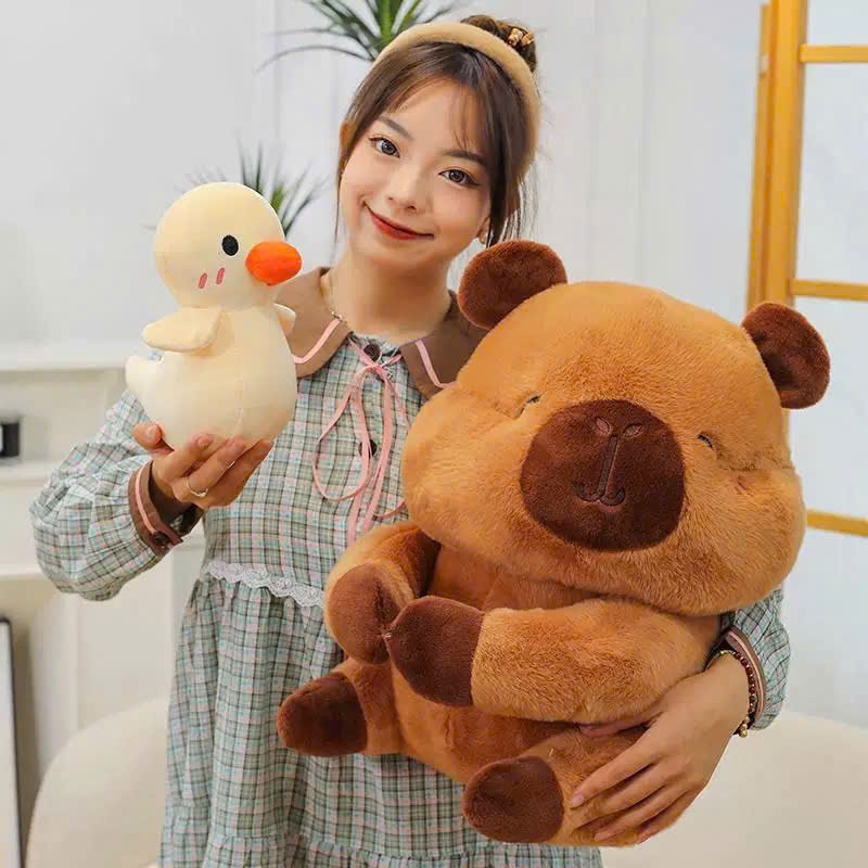 Gấu bông capybara ôm vịt vàng dễ thương Capybara má phính mắt híp ôm vịt hàng cao cấp đầy đủ tem mác