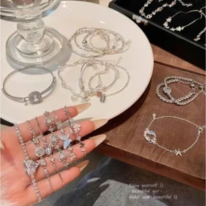 Vòng tay đính đá pha lê cao cấp với họa tiết trái tim, bướm và charm độc đáo, tỏa sáng rực rỡ, phụ kiện thời trang