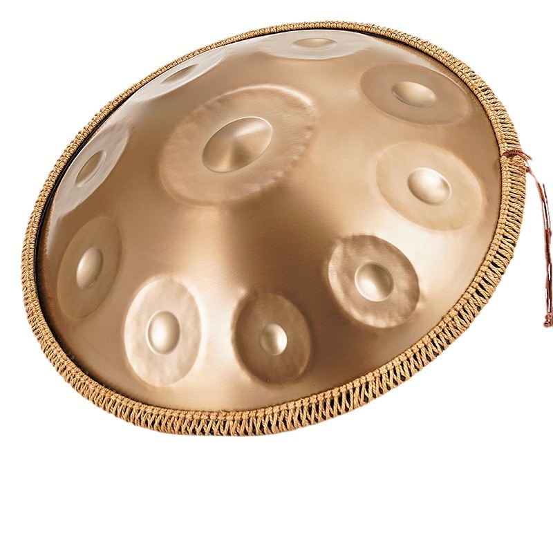 Trống handpan 10 note màu đồng - Đầy đủ phụ kiện (Túi đựng,khăn lau,giá để trống,dùi trống,dầu lau)