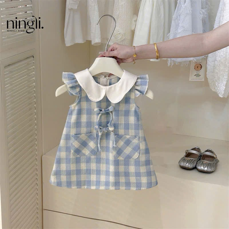 (Sẵn 90) Váy cổ bèo kẻ caro tay xoè đính khuy nơ phong cách Hàn Quốc dành cho bé gái