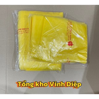 1kg túi nilon trong màu vàng có quai, chất dai đẹp đựng 15kg