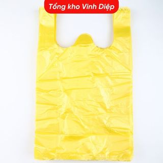 1kg túi nilon trong màu vàng có quai, chất dai đẹp đựng 15kg