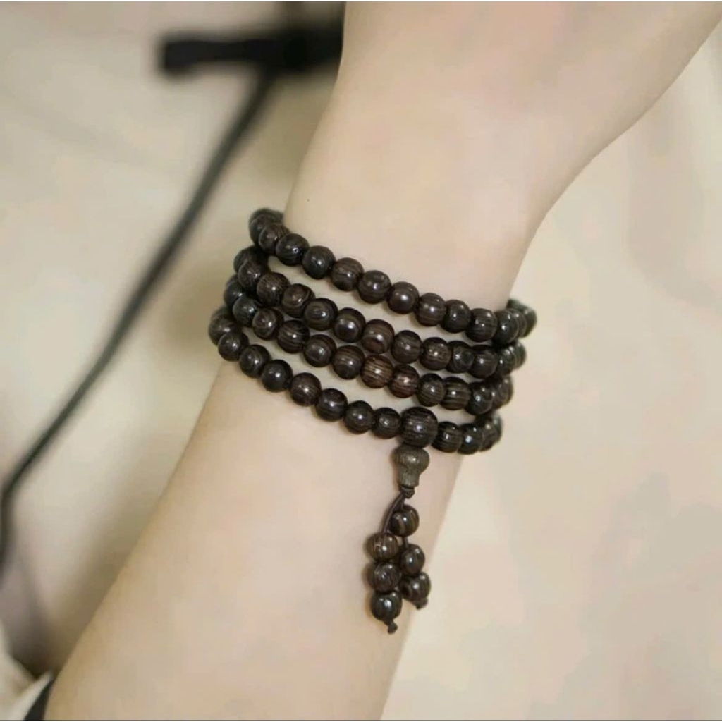 Chuỗi 108 hạt 6 ly gỗ Mun Đuôi Công