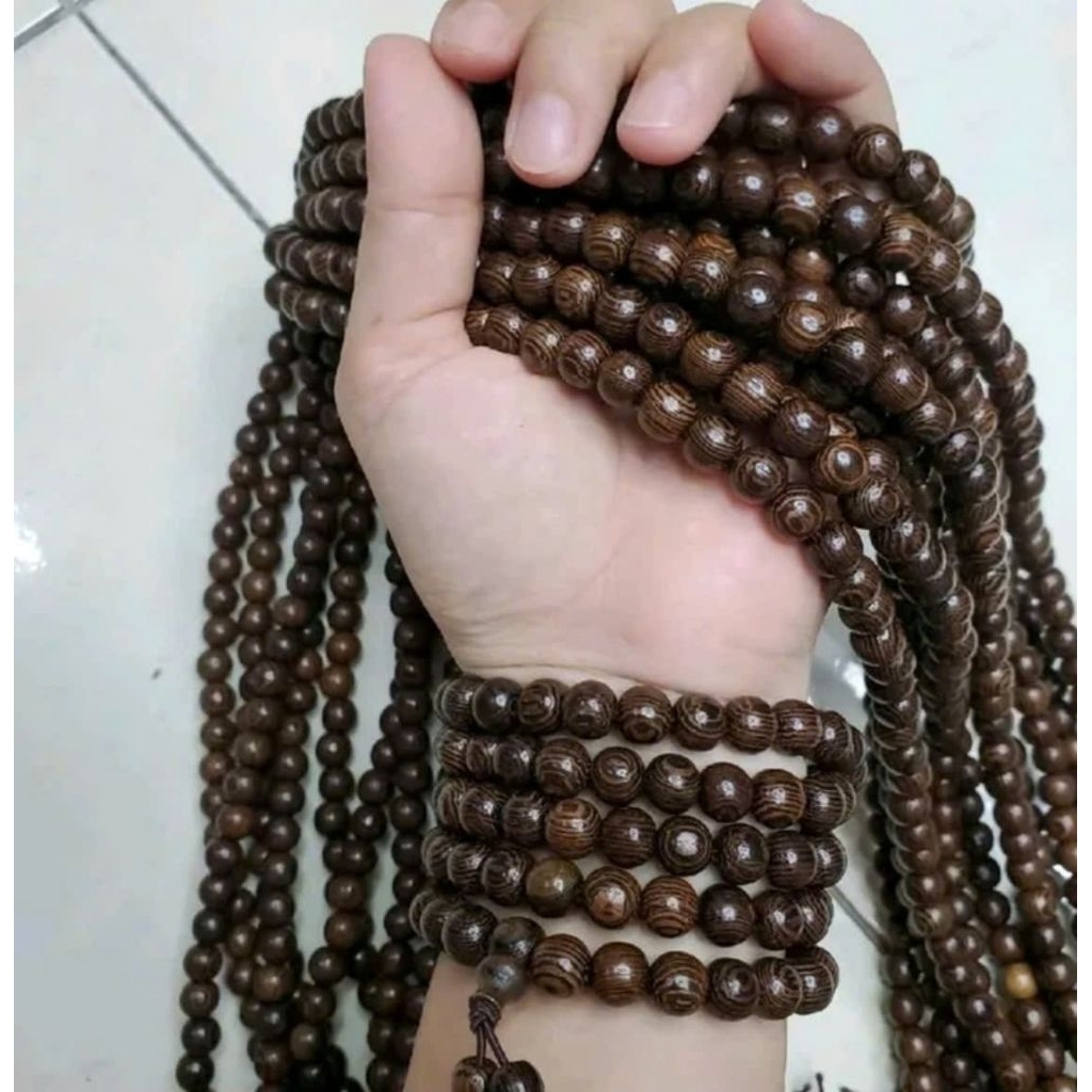 Chuỗi 108 hạt 6 ly gỗ Mun Đuôi Công