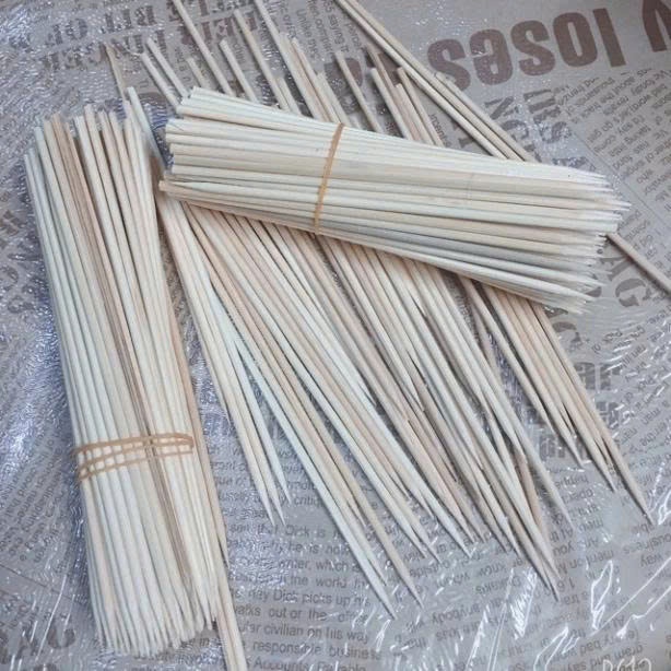 100g que xiên làm cành hoa sáp,hoa lụa,hoa giấy