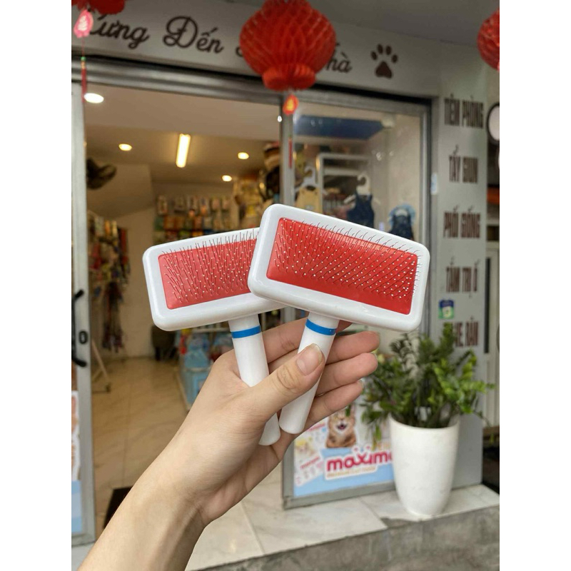 Lược đánh bông chải lông cán nhựa trắng