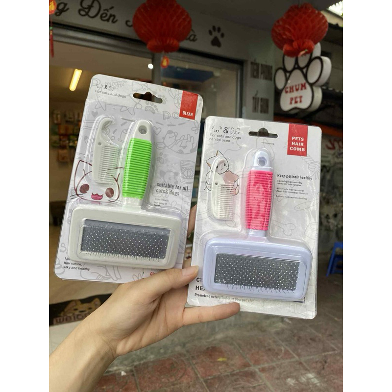 Lược đánh bông chải lông cán nhựa trắng