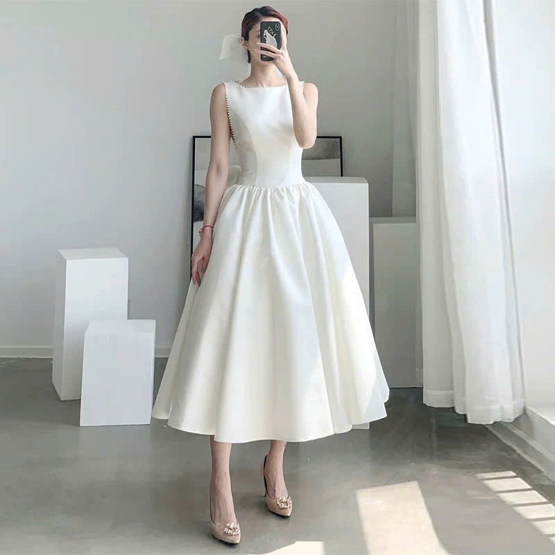 Đầm Xòe Dáng Dài Hở Lưng Đính Nơ – Chất Tapta Cao Cấp, Đầm Dự Tiệc Sang Chảnh