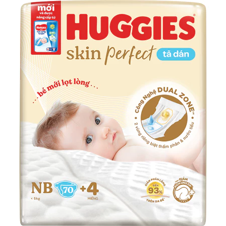 Tã/bỉm dán sơ sinh Huggies Skin Perfect NB70+miếng ngẫu nhiên với 2 vùng thấm giảm kích ứng da
