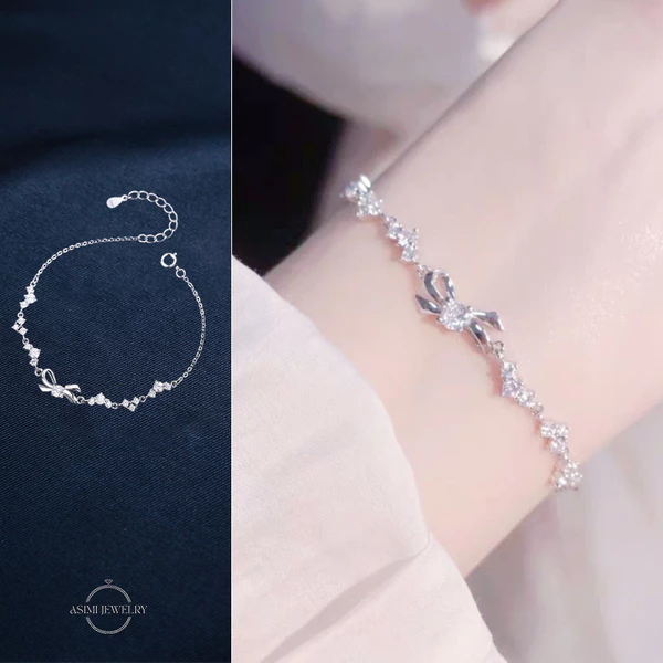 Lắc tay bạc nữ nơ Charmélia Asimi Charmélia LT42 - đeo trên mẫu