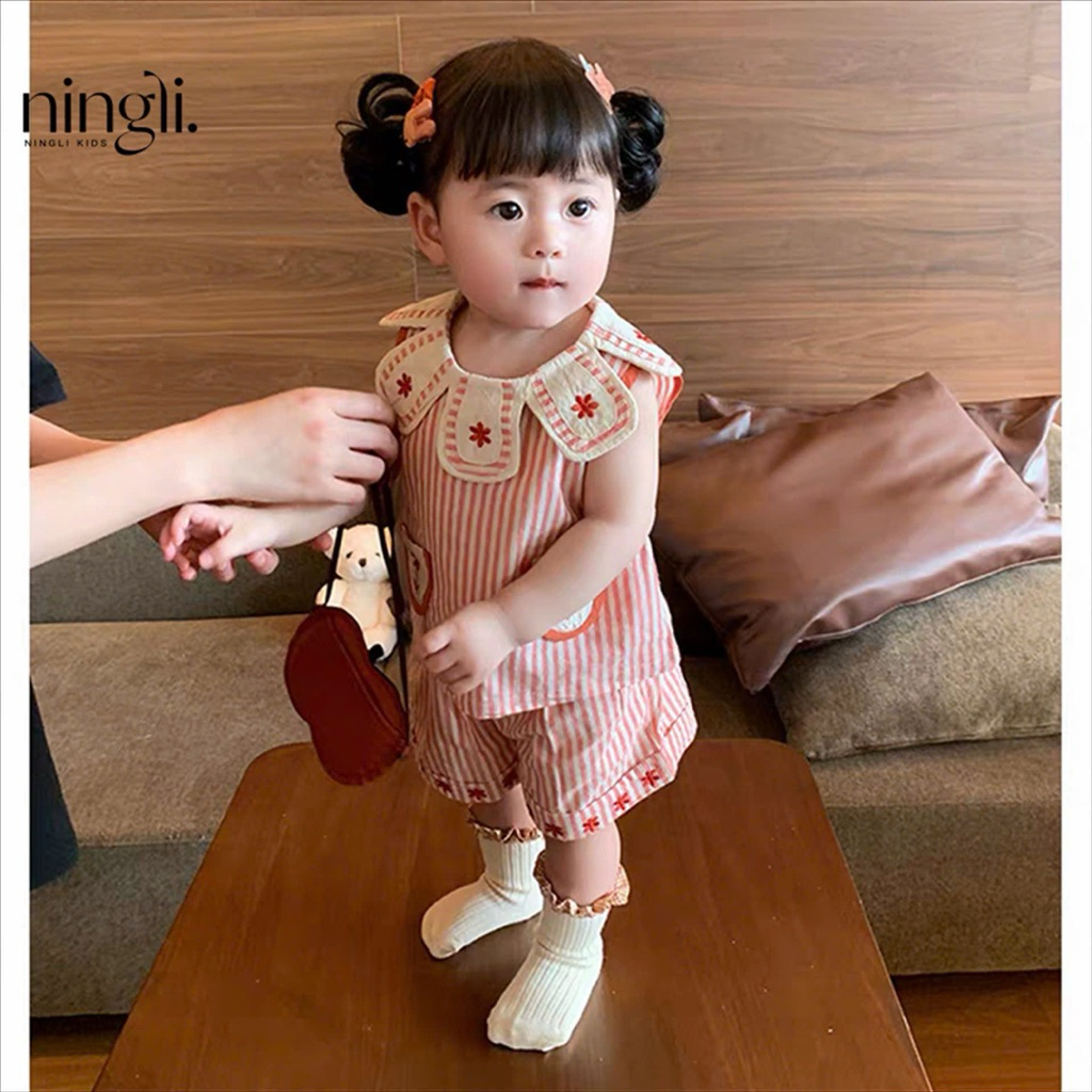 (Order) Bộ quần áo kẻ sọc đỏ hoạ tiết hoa, cổ hình bông hoa đáng yêu danhg cho bé gái