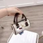 Túi xách nữ mini dáng trống da PU họa tiết Hello Kitty tặng kèm dây đeo chéo và charm bông gấu xinh yêu - ST993