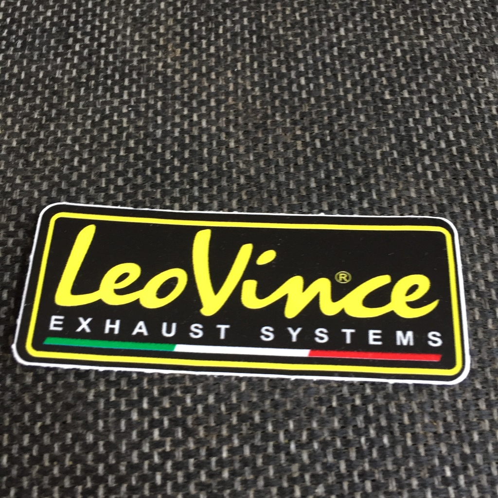 LEOVINCE nền đen[7.5x3cm] decal cao cấp chống nước, sắc nét, bền màu, dính chặt. Hình dán logo trang trí mọi nơi