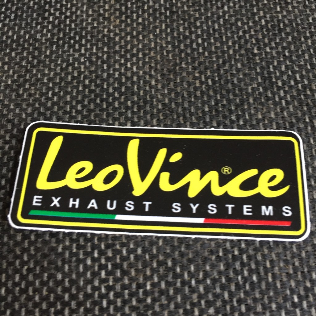 LEOVINCE nền đen[7.5x3cm] decal cao cấp chống nước, sắc nét, bền màu, dính chặt. Hình dán logo trang trí mọi nơi