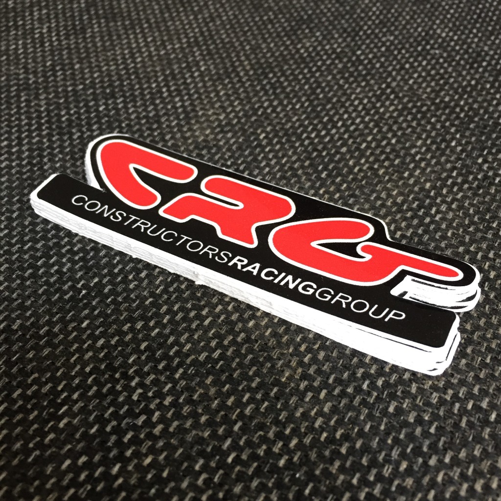 CR G [9x2.8cm] decal cao cấp chống nước, sắc nét, bền màu, dính chặt. Hình dán logo trang trí mọi nơi, in theo yêu cầu