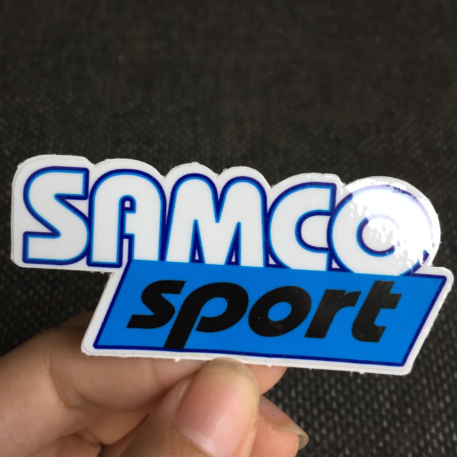 SAMCO[7.5x3.5cm] decal cao cấp chống nước, sắc nét, bền màu, dính chặt. Hình dán logo trang trí mọi nơi
