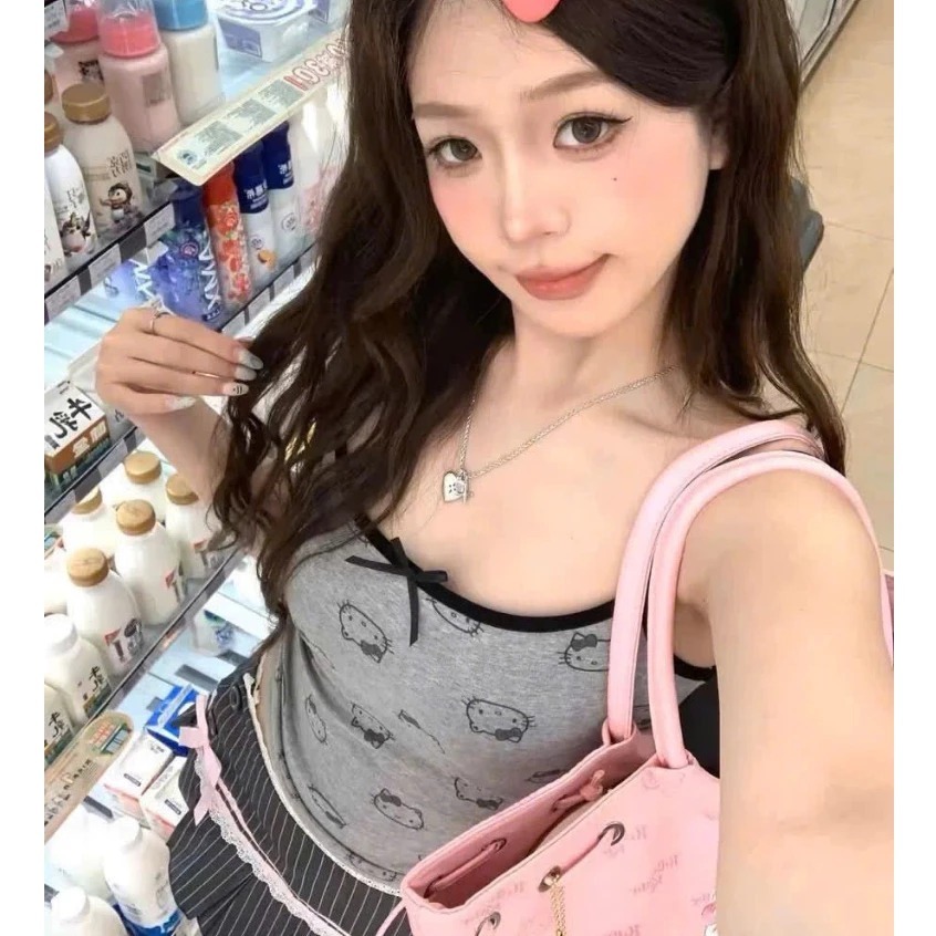 Áo 2 dây nữ đính nơ in kín mặt mèo siêu sexy kèm đệm ngực-Áo 2 dây nữ sexy fresize 38-55kg