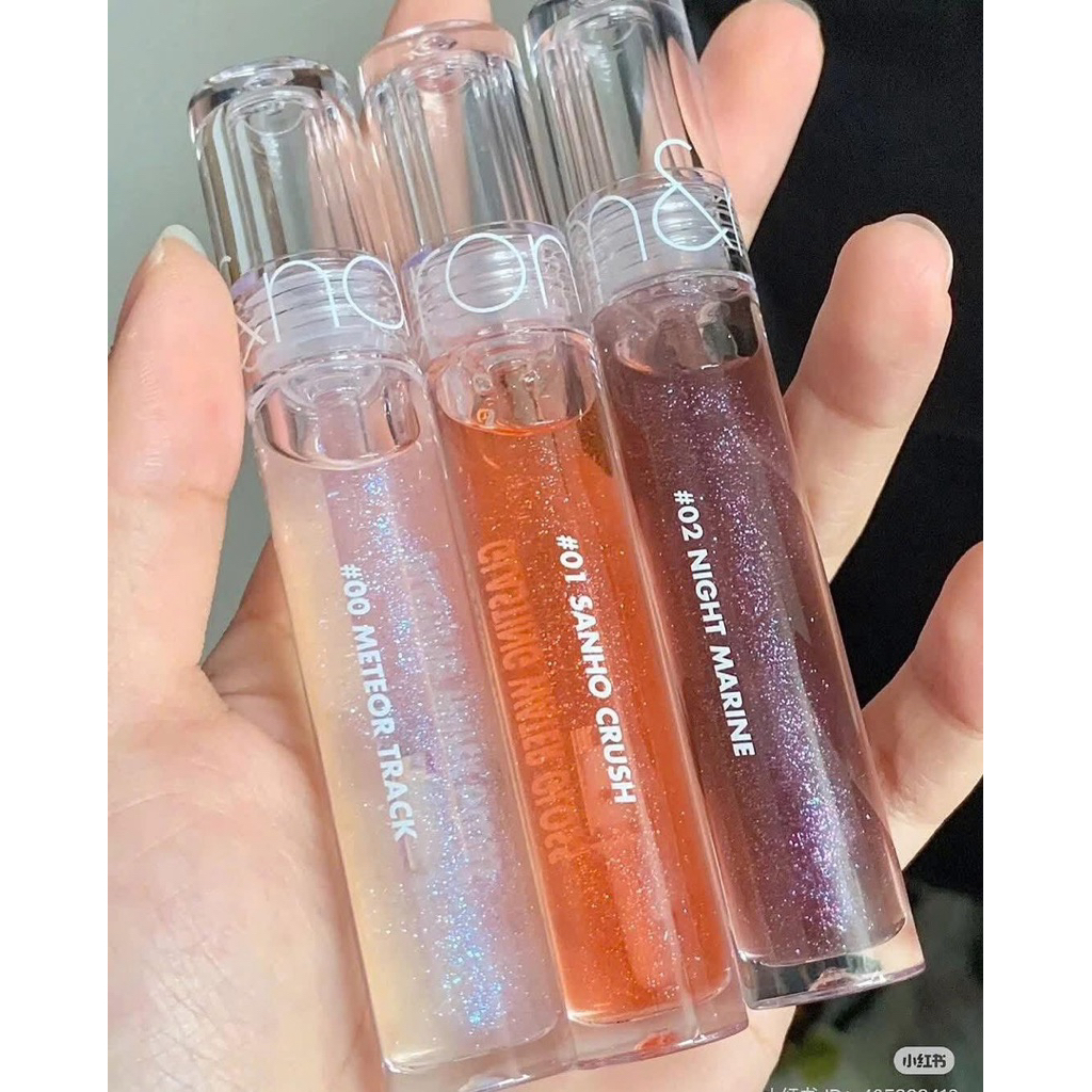 Son bóng nội địa Hàn - Son bóng 00 Meteo Track Ro Mang  Lip Gloss, giúp đôi môi căng mọng tự nhiên.