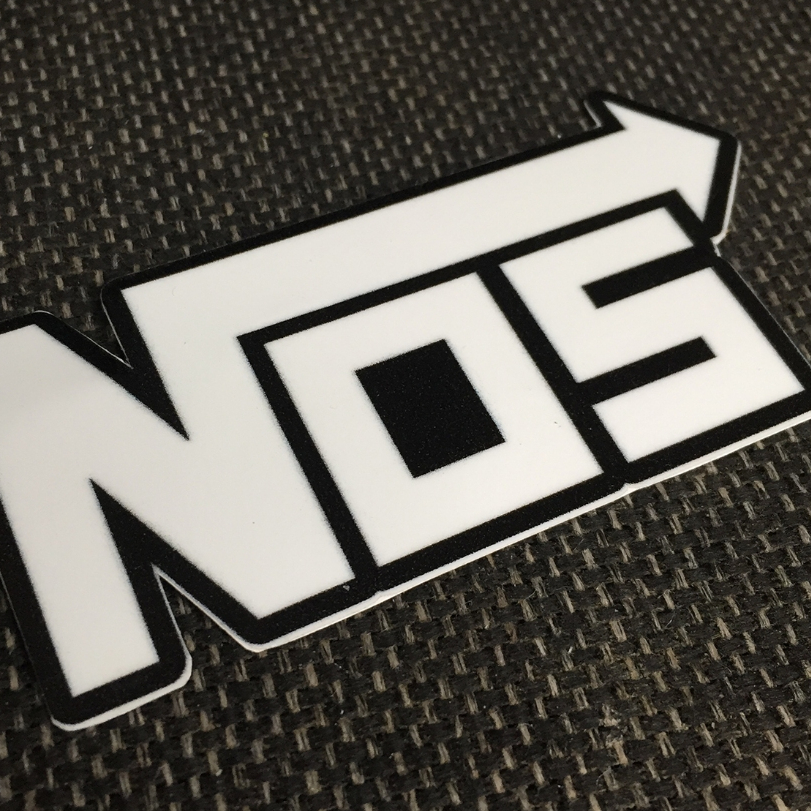 Logo NOS[9.1x4.1cm] trắng nền đen. Hình dán decal siêu dính, chống nước, tem đua trang trí