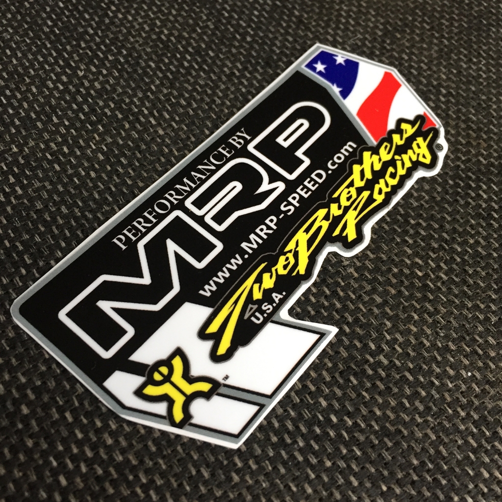 Logo TBs racing. Kích thước 10.4 x 5.8cm. Hình dán decal siêu dính. Chống nước, tem đua trang trí.