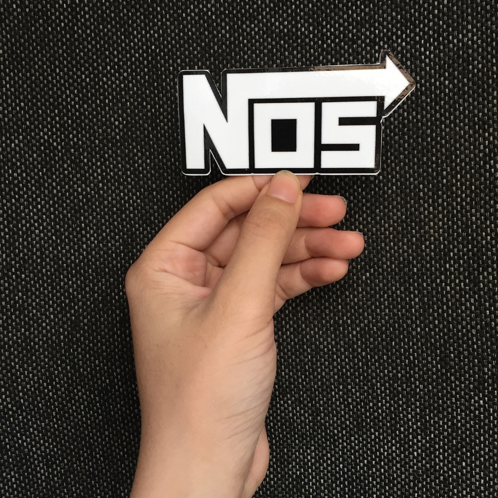 Logo NOS[9.1x4.1cm] trắng nền đen. Hình dán decal siêu dính, chống nước, tem đua trang trí