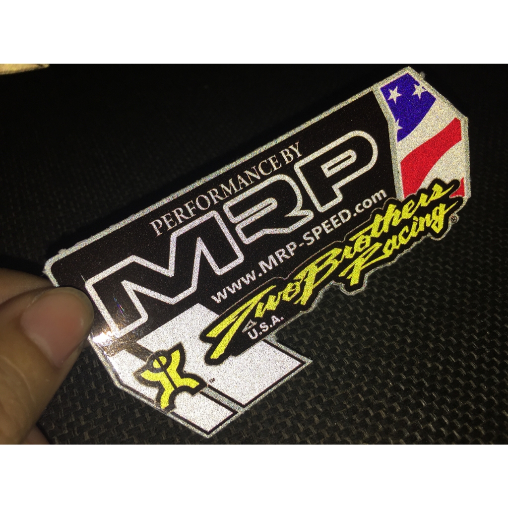 Logo TBs racing chất liệu phản quang . Kích thước 10.4 x 5.8cm. Hình dán decal siêu dính. Chống nước, tem đua trang trí.