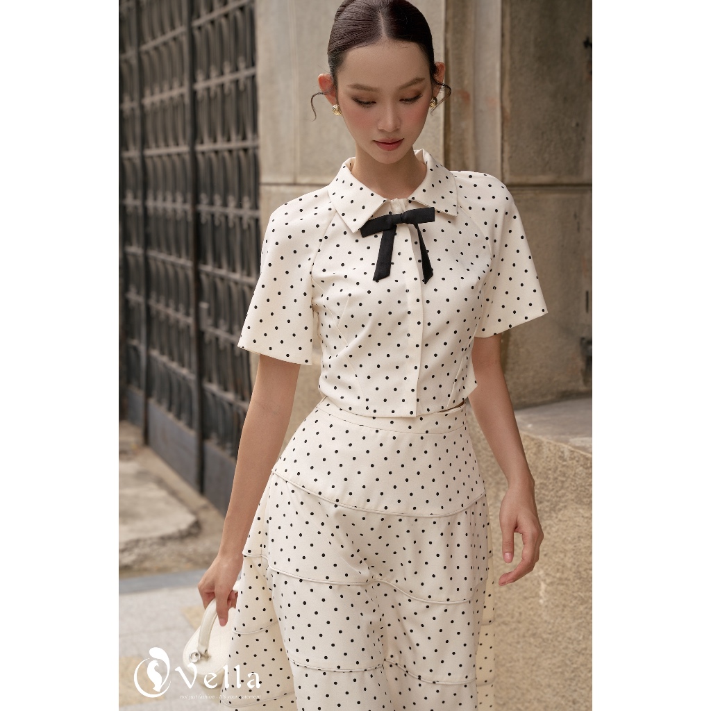 Áo croptop sơ mi nữ tay ngắn chấm bi cài nơ, váy xòe chấm bi Vella Fashion VA25062 & VV25063