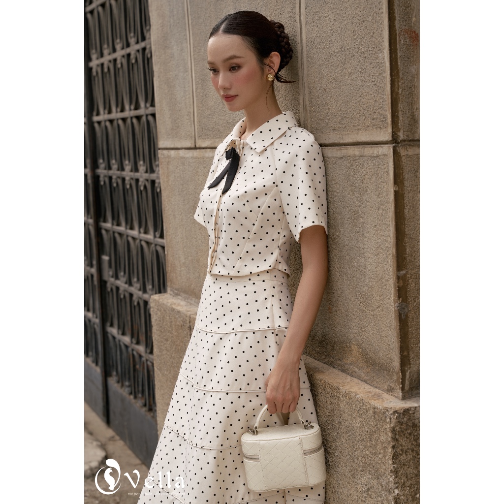 Áo croptop sơ mi nữ tay ngắn chấm bi cài nơ, váy xòe chấm bi Vella Fashion VA25062 & VV25063