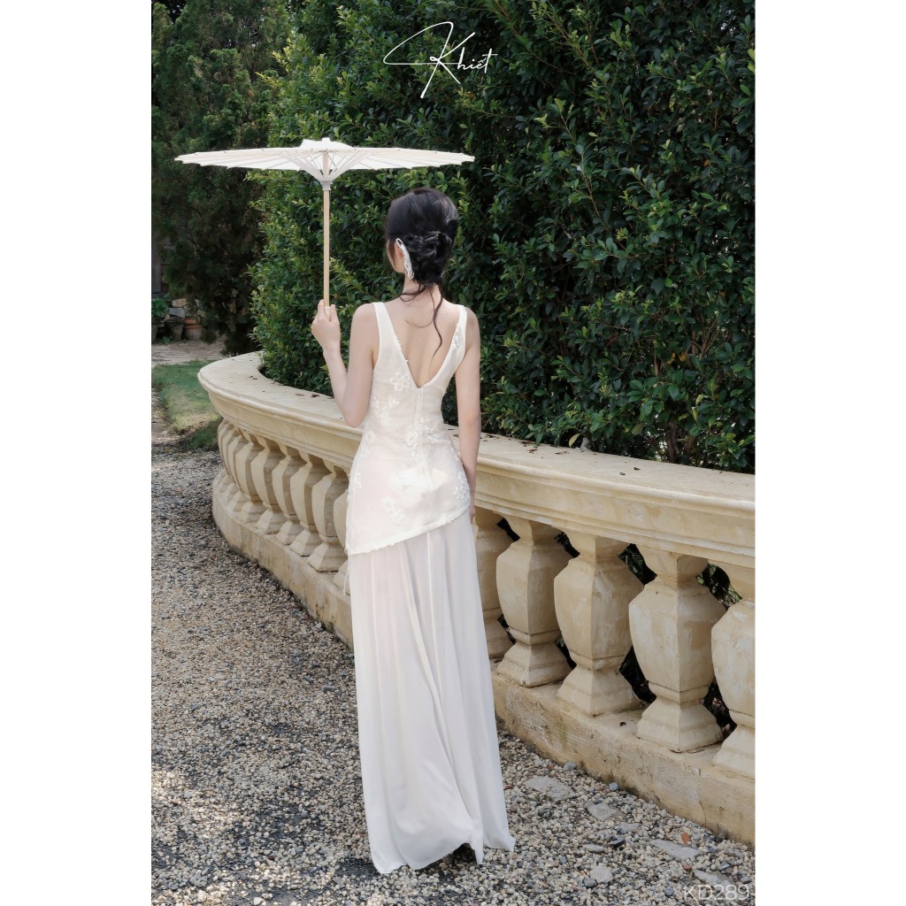 Đầm maxi dài ren hoa 3D Khiết Style phối dây đan mắt cáo màu kem, phong cách nàng thơ nhẹ nhàng KD289
