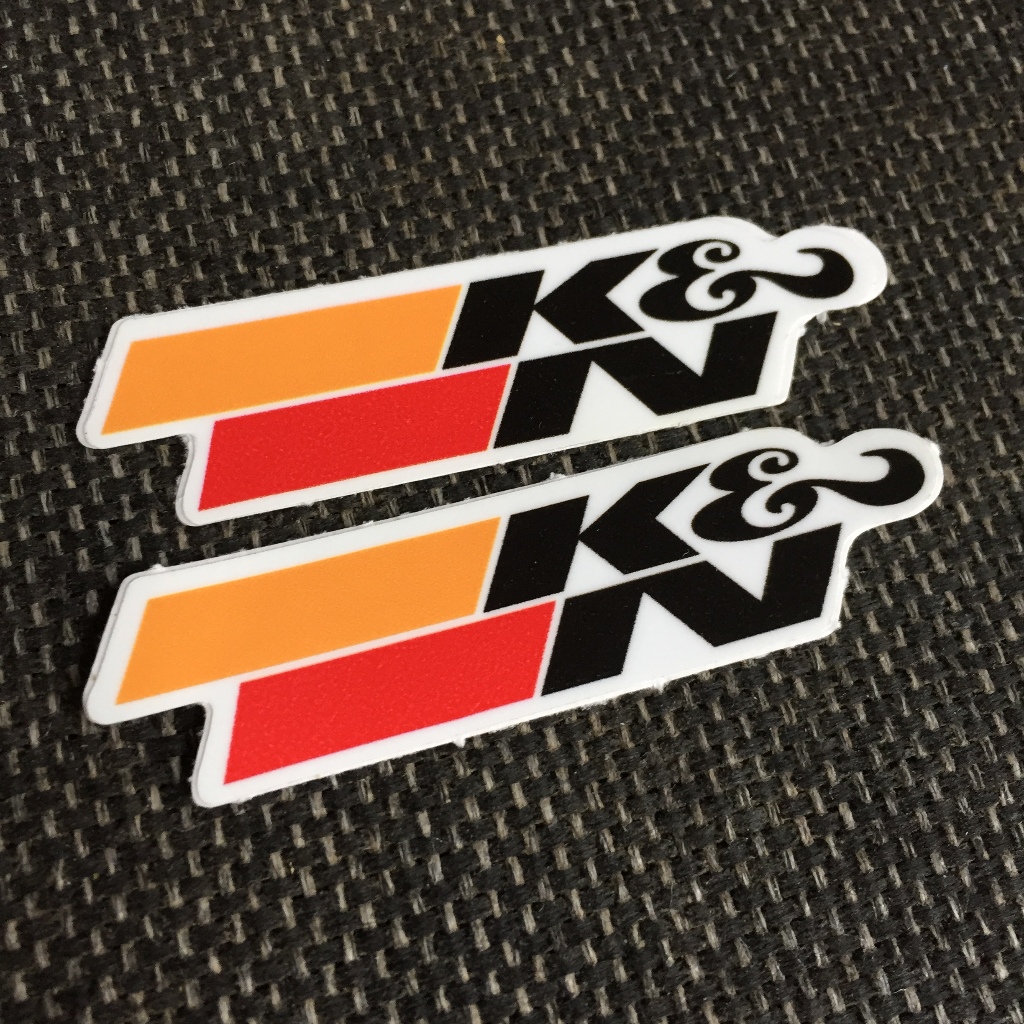 K&N viền trắng[7.7x2.1cm] decal cao cấp chống nước, sắc nét, bền màu, dính chặt. Hình dán logo trang trí mọi nơi