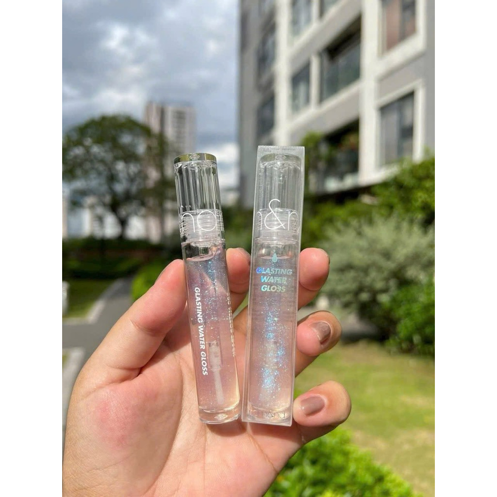 Son bóng nội địa Hàn - Son bóng 00 Meteo Track Ro Mang  Lip Gloss, giúp đôi môi căng mọng tự nhiên.