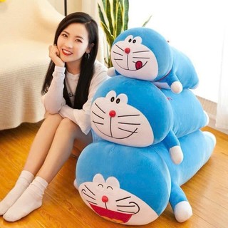 gấu ôm nhồi bông hình doremon siêu đáng yêu làm quà cho các bé , dùng tặng sinh nhặt , tặng qua cho bạn bè người yêu