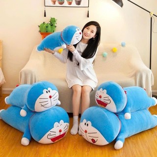 gấu ôm nhồi bông hình doremon siêu đáng yêu làm quà cho các bé , dùng tặng sinh nhặt , tặng qua cho bạn bè người yêu