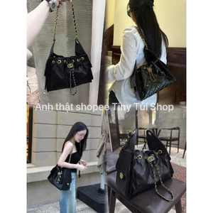 Túi xách công sở co,co dây rút hot trend sang chảnh dễ mix đồ đeo va