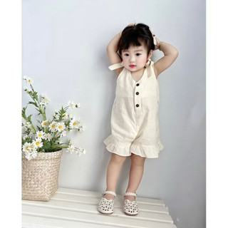 Bodysuit bé gái màu kem dáng yếm buộc nơ