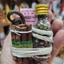 Handcrafted Metal Figurine with Traditional Thai Fabric & Wood