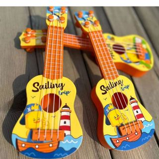 Đồ chơi đàn Ukulele mini vịt vàng đáng yêu, đàn guitar phát triển tài năng âm nhạc cho bé HT Toys