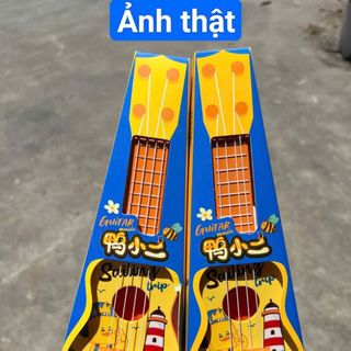 Đồ chơi đàn Ukulele mini vịt vàng đáng yêu, đàn guitar phát triển tài năng âm nhạc cho bé HT Toys