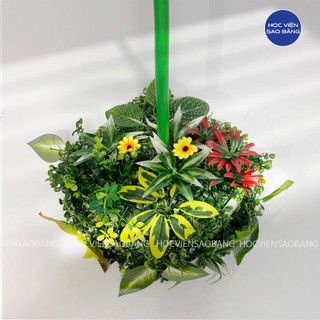 Hoa giả che phủ chân đế hoa khổng lồ, cột hoa bóng bay, đường kính phủ rộng từ 25 - 30cm