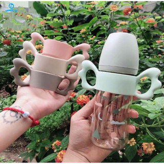 Tay cầm bình sữa silicone phù hợp với tất cả các loại bình.